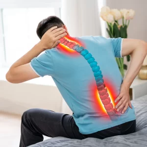 Person with back pain needing Warragul chiropractic care for relief.