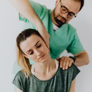 Teacher visiting a chiropractor Mickleham clinic for neck and back pain caused by driving long hours