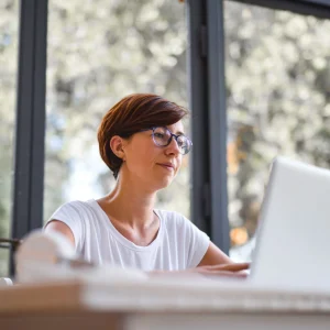 A woman working on her laptop